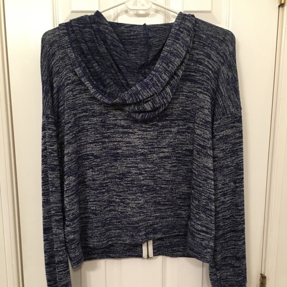 A blue and white printed zip up